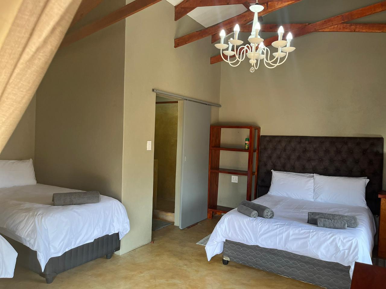 Family Unit Bedroom - Queen and twin beds with air conditioning, sleeps 4 people